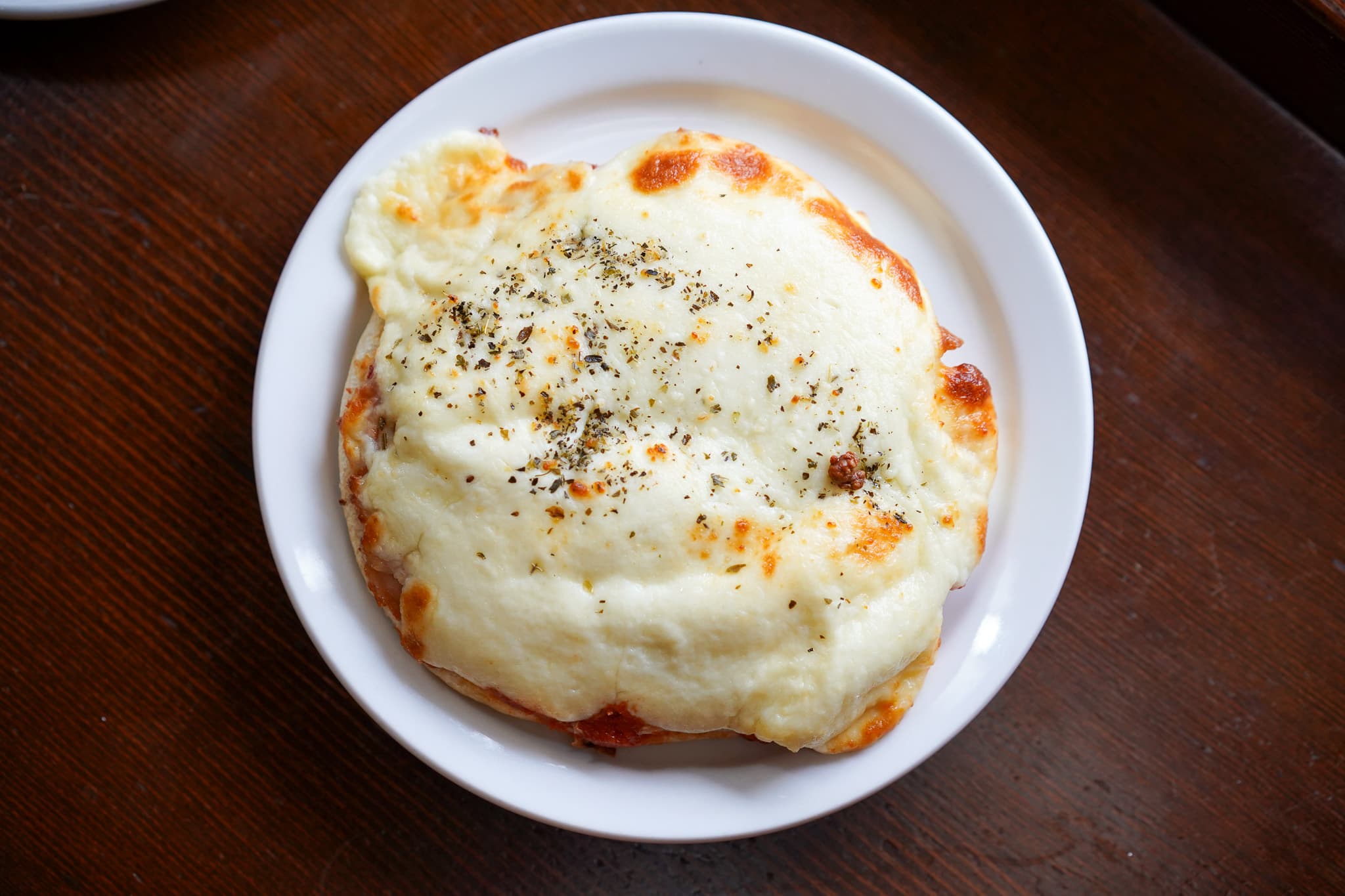 A pizzetta — Ottavio dough, fresh tomato, and cheese, from the caffè